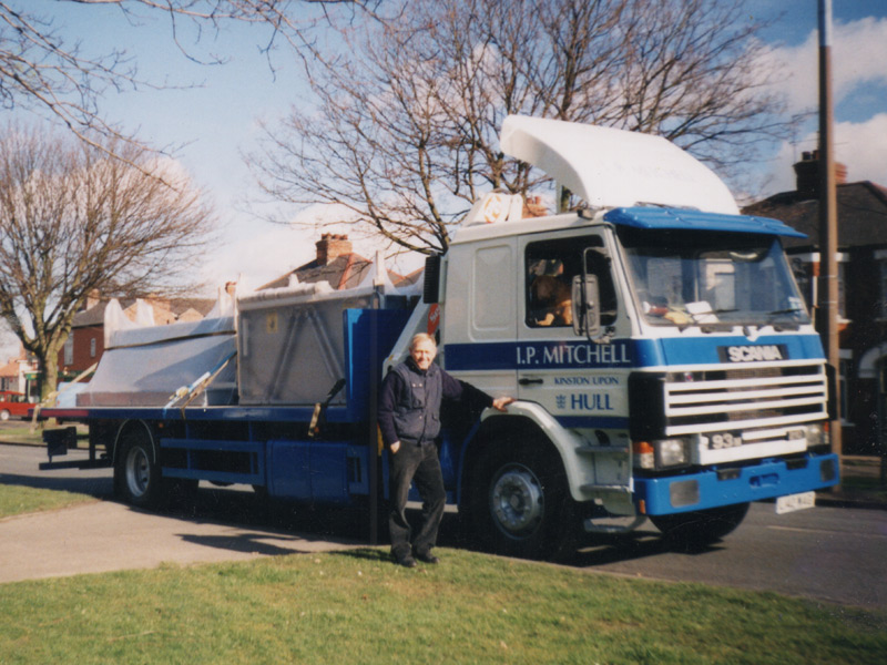The late Peter Mitchell proud to be standing next to his beloved Scania.